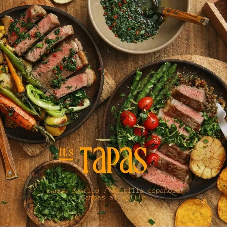 It's Tapas brand visual: wordmark with the three signature dishes
